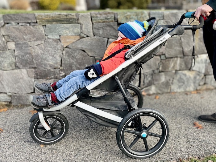 Toddler riding in the Thule Urban Glide 2