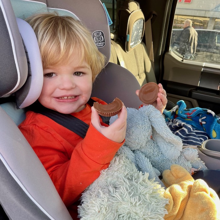 Toddler eating in car seat