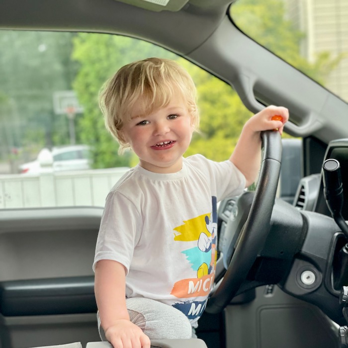 Toddler driving hot sale car