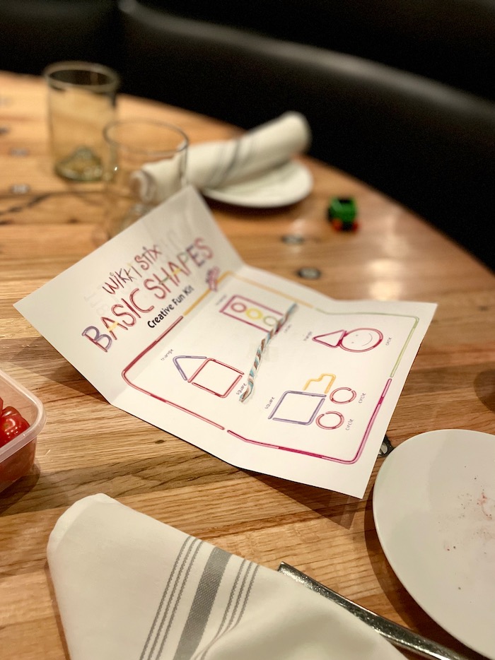 Tips for keeping a toddler happy at a restaurant without screen time