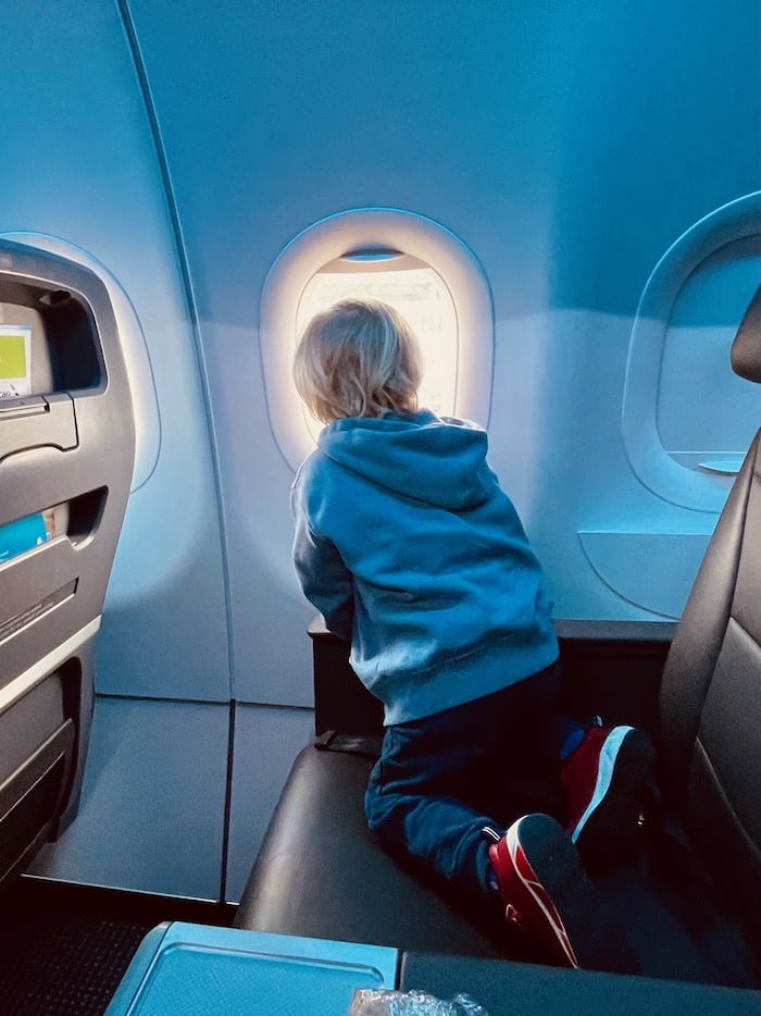 Toddler in airplane seat