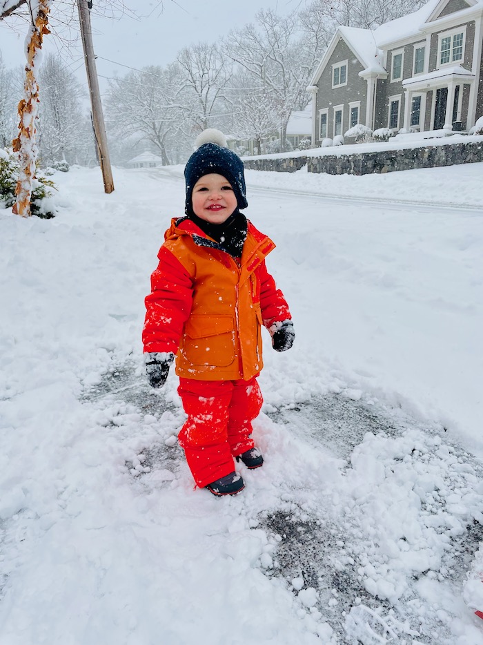 Toddler in snowsuit