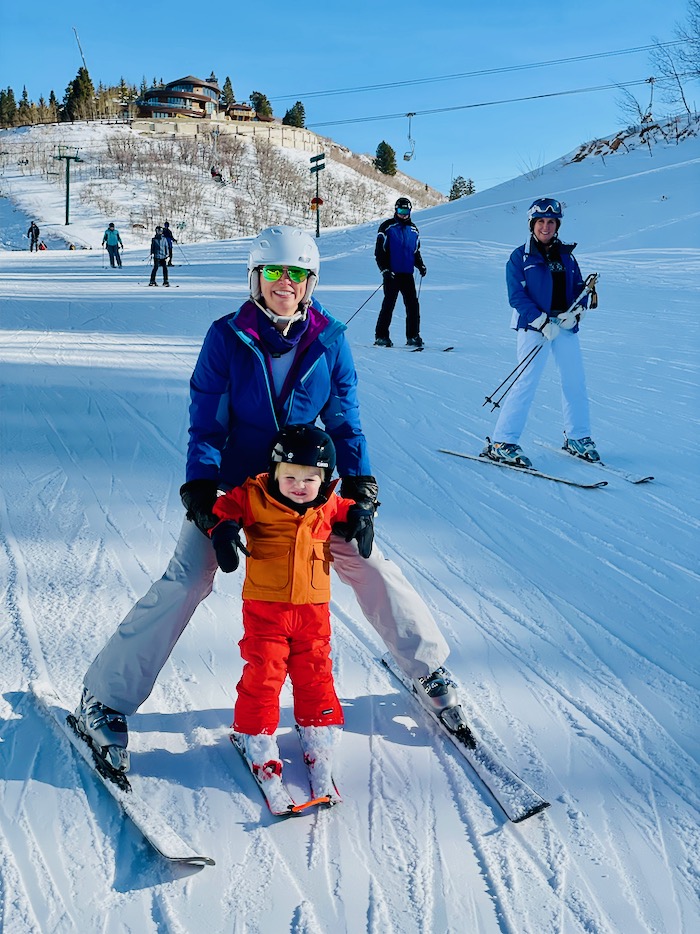 Toddler and mom on the ski slope