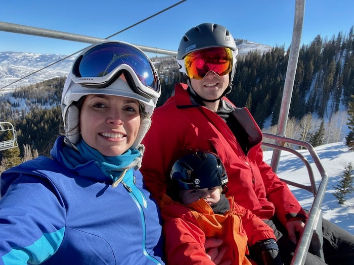 Toddler and parents on the chairlift