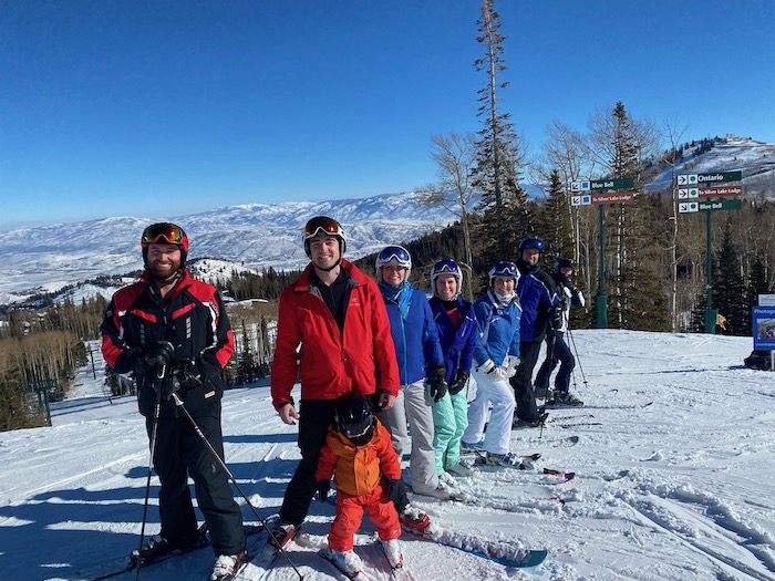 Toddler and family ready to ski